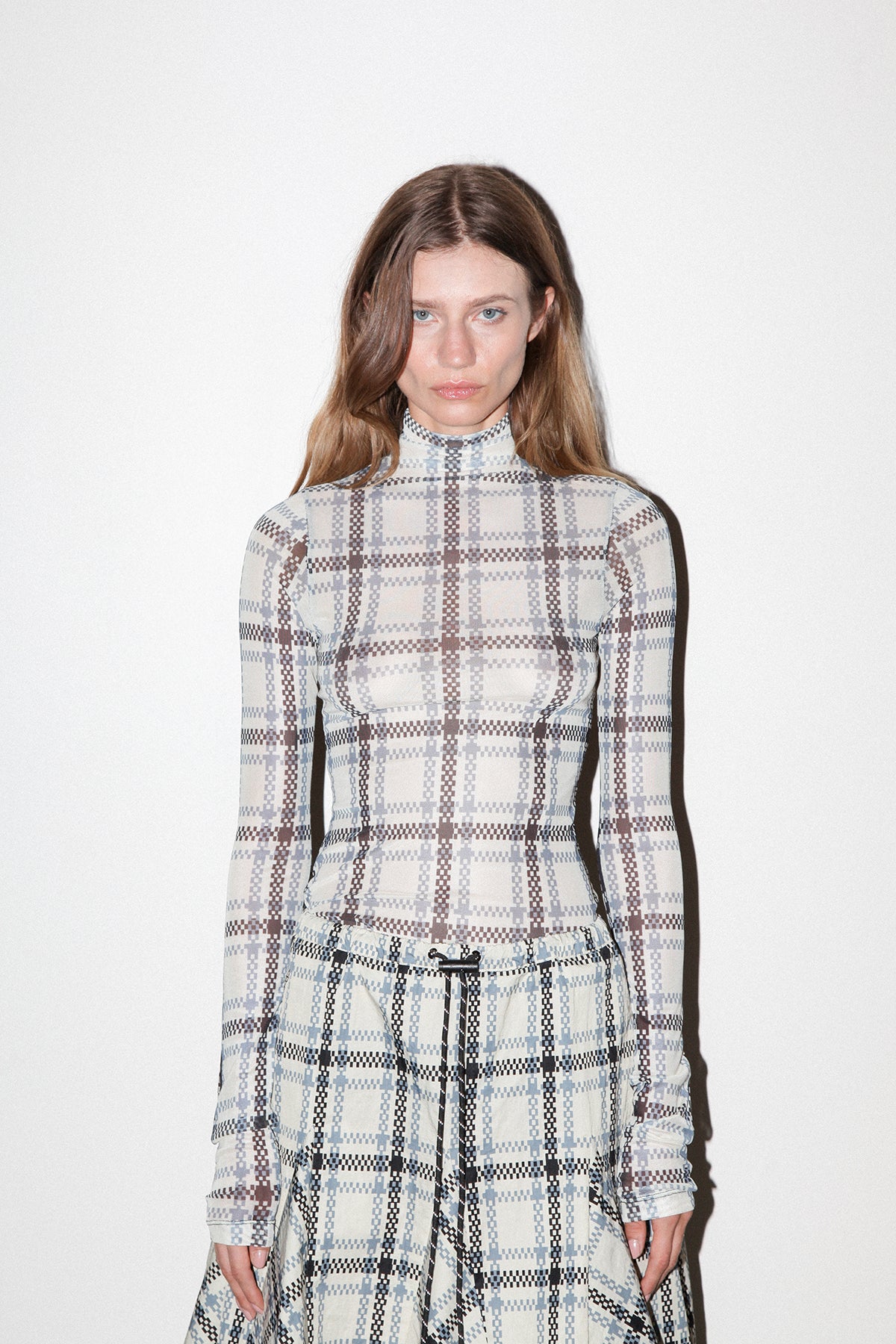 Split Turtleneck in Mixed Plaid