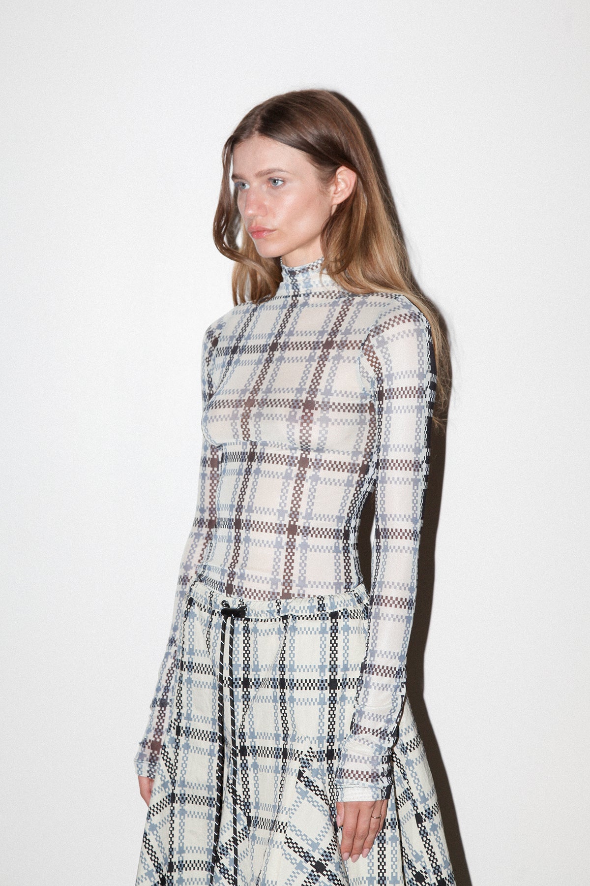 Split Turtleneck in Mixed Plaid