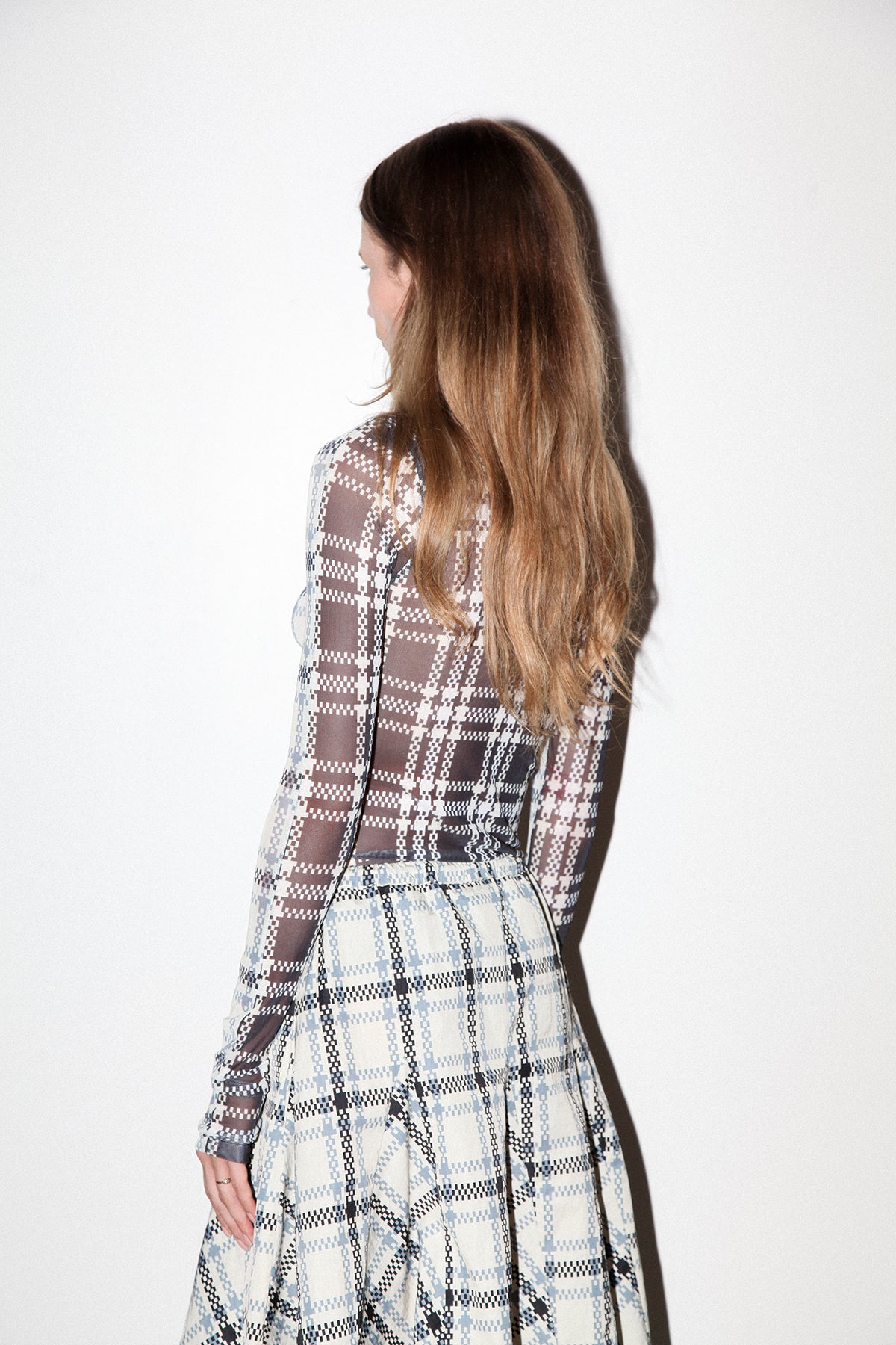 Split Turtleneck in Mixed Plaid