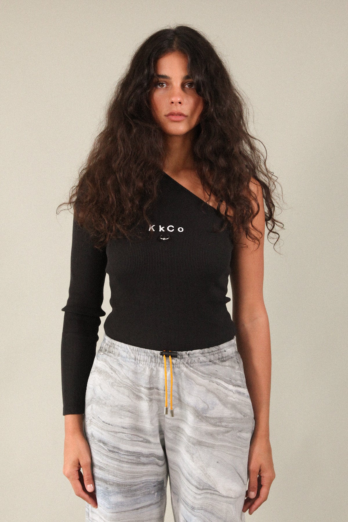 Pierced Reversible Asymmetrical Long Sleeve Rib in Black